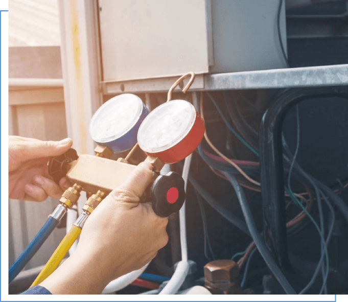 A person is working on an air conditioner.